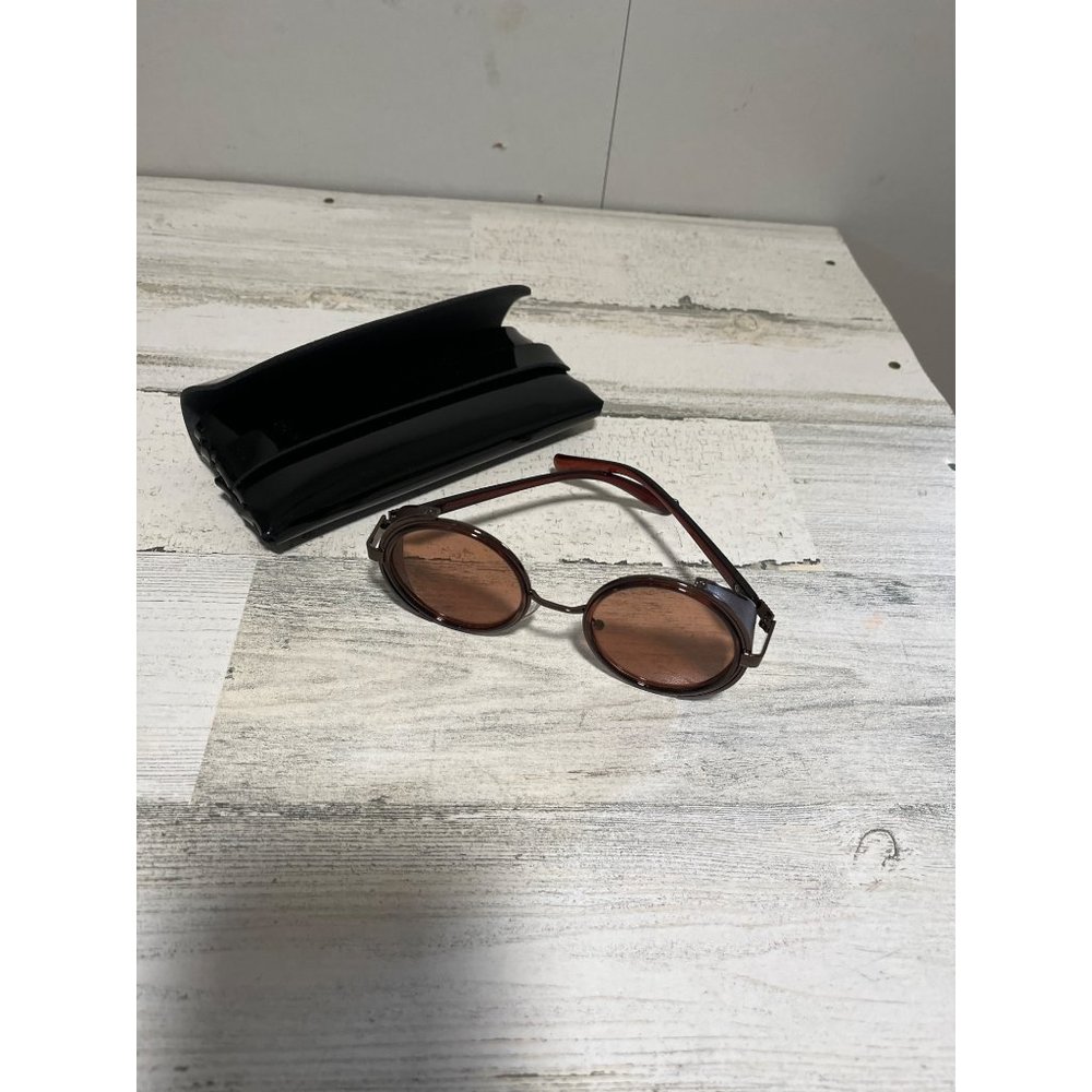 Glasses round amber tinted with black case